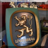 C30. Lowenbrau beer sign.